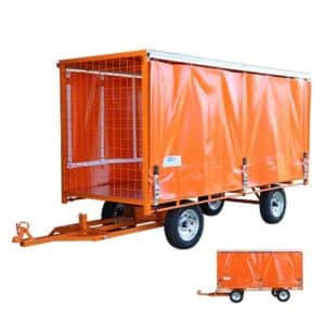 . Large towable trailers with PVC side curtains. For transportation of goods within a corrections facility